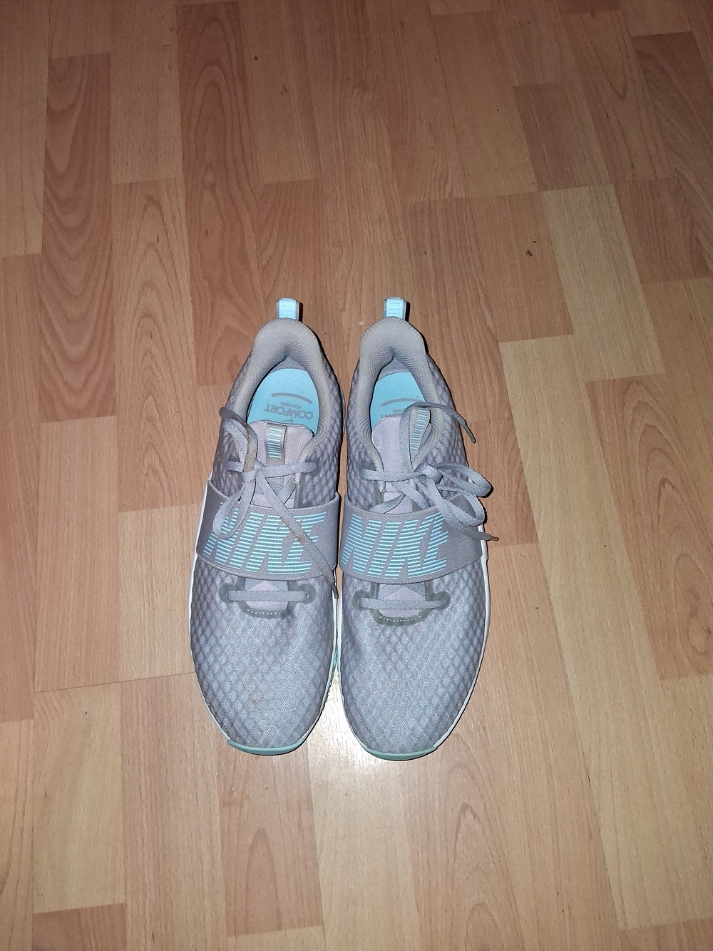Nike Women's Light Gray Sneakers with Mint Accents